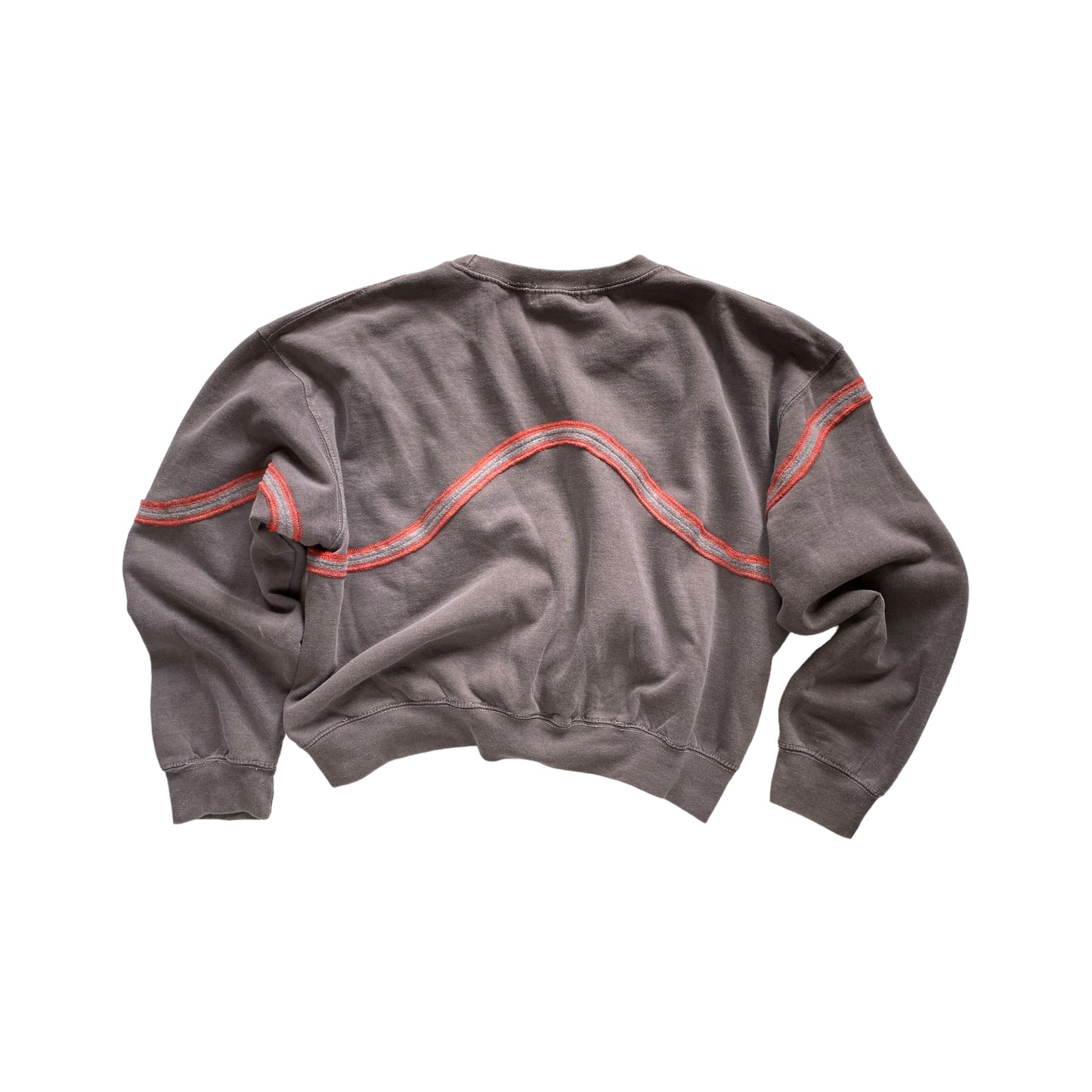 back of warm grey crewneck sweatshirt with orange edged wavy seam across the back and arms