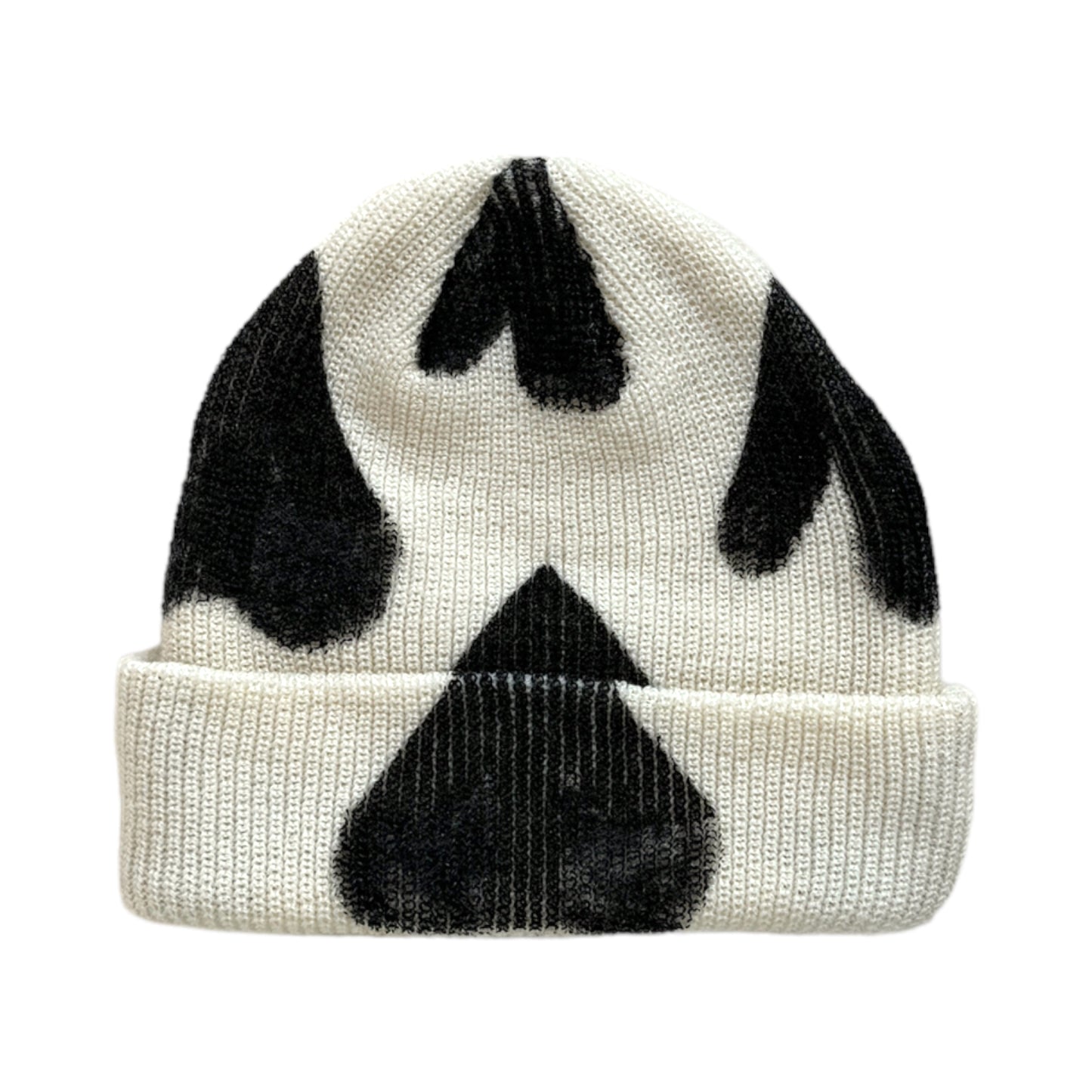 back of cream beanie with black hand painted hearts