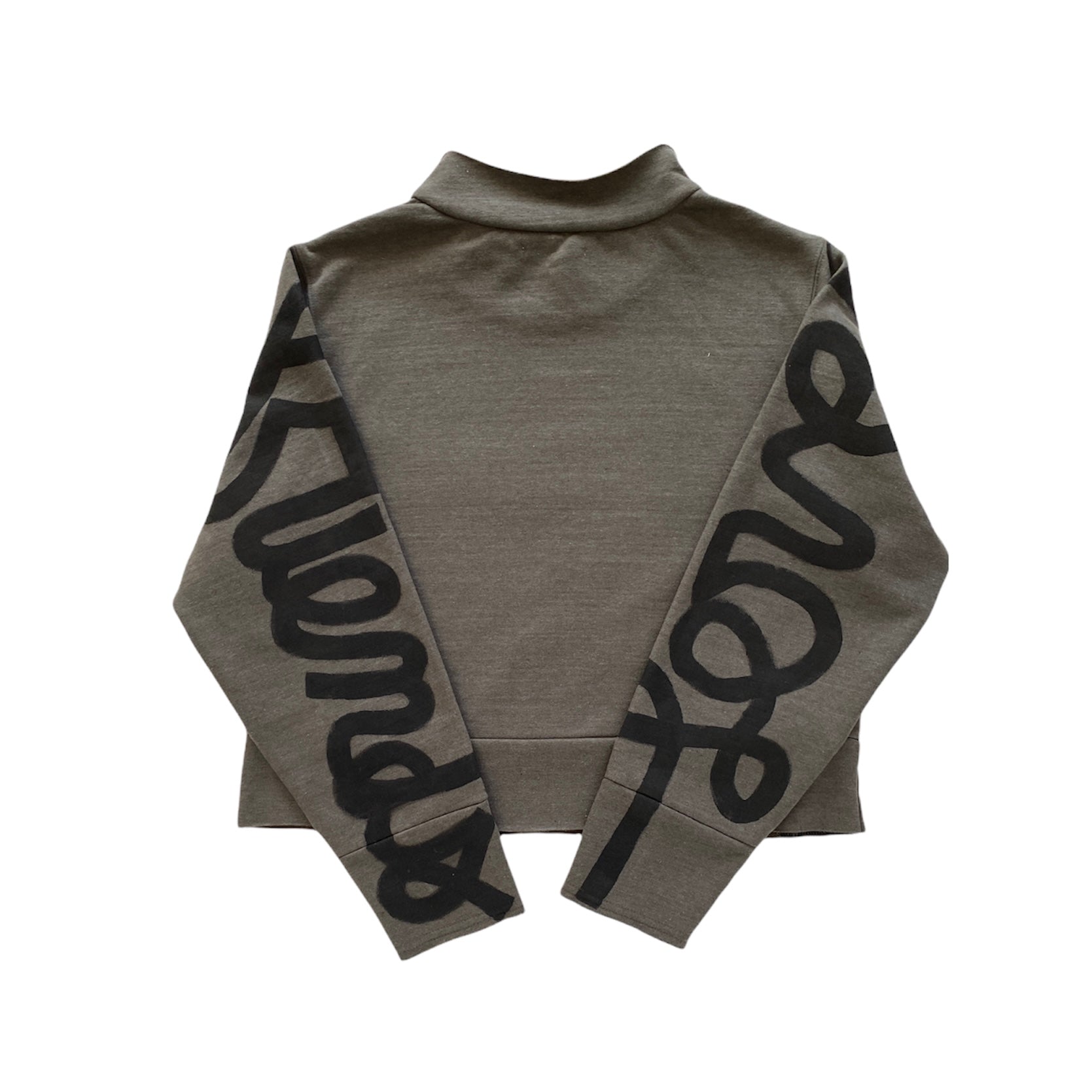 back of olive green mockneck sweatshirt with arms folded back to expose hand painted cursive writing reading LOVERS on one arm and FRIENDS on the other in black