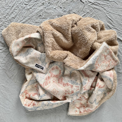 Upholstered blanket
