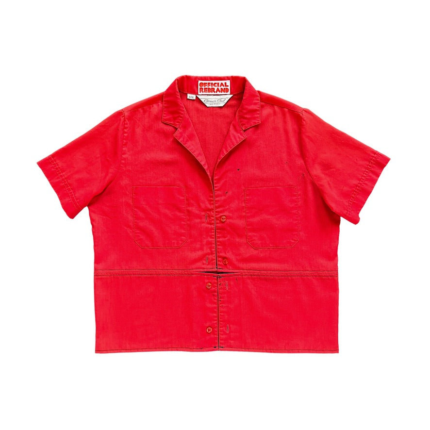 red button down sort sleeve with two front chest pockets and flipped buttons