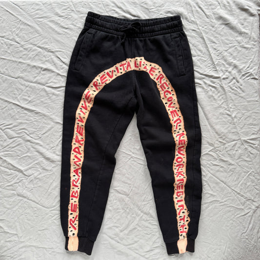 WEAR AND TEAR - REBRAND REVIVE bleached sweatpants