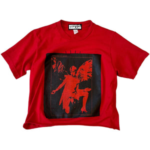Cropped red T-shirt with black screen-printed graphic of kneeling claud cahun angel figure with text reading ANGELS HAVE NO GENDER