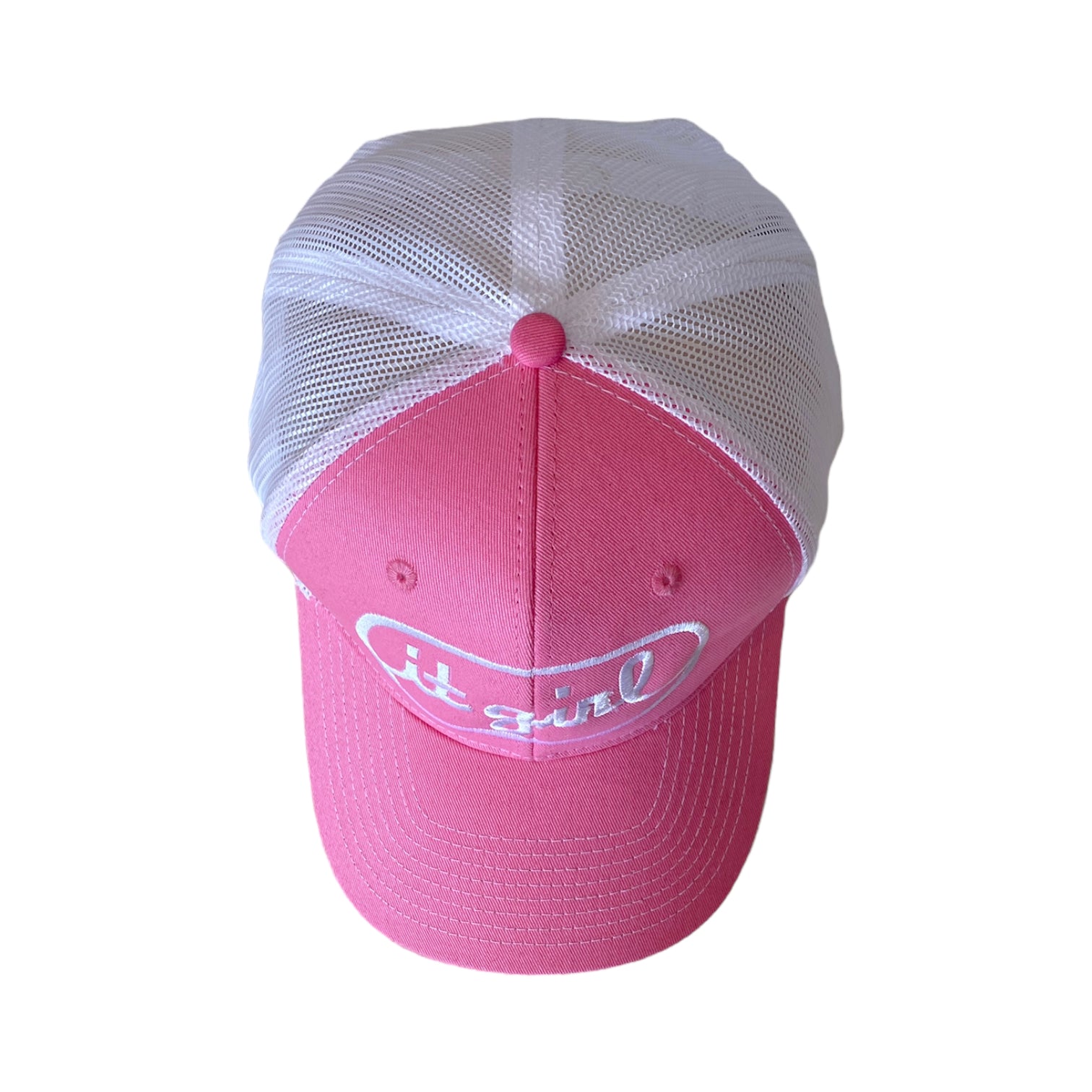 top down view of pink and white trucker hat with white embroidery reading it girl in cursive