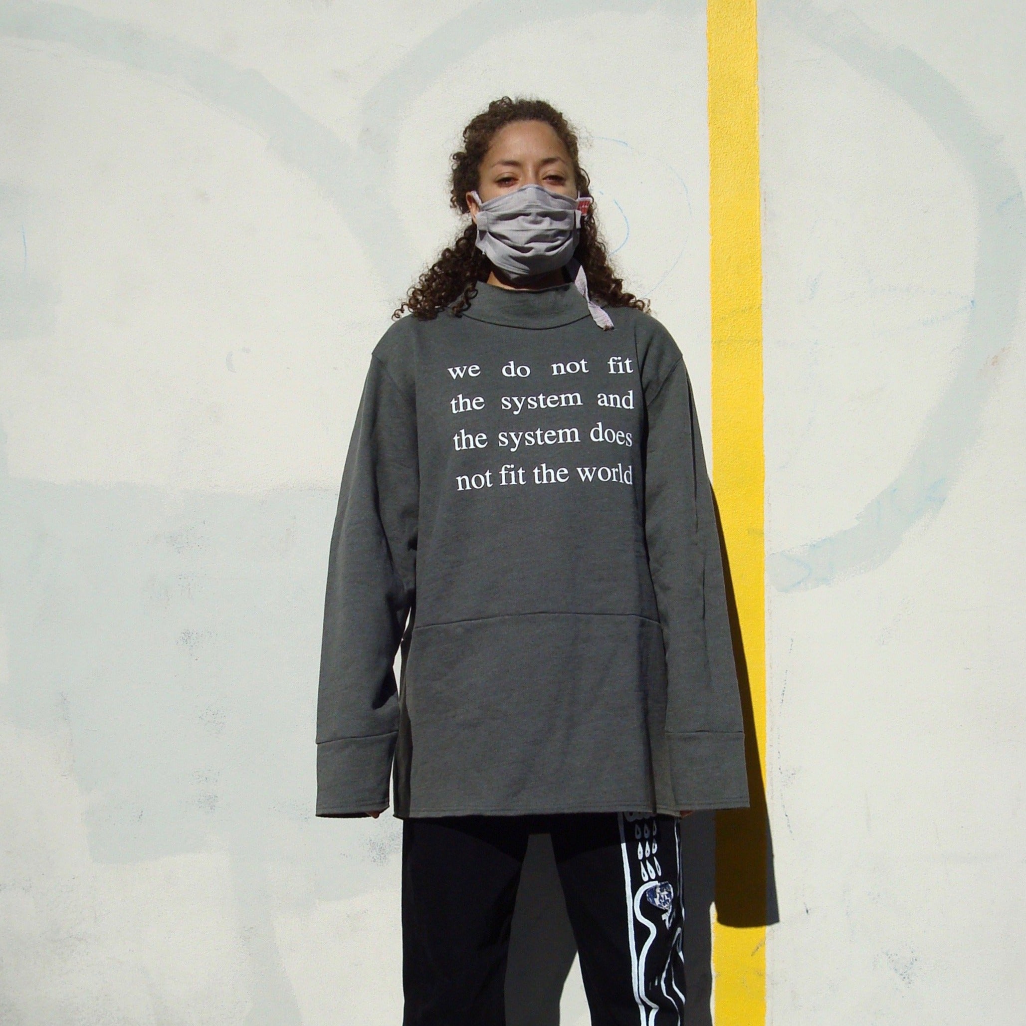WE DON'T FIT THE SYSTEM cropped sweatshirt