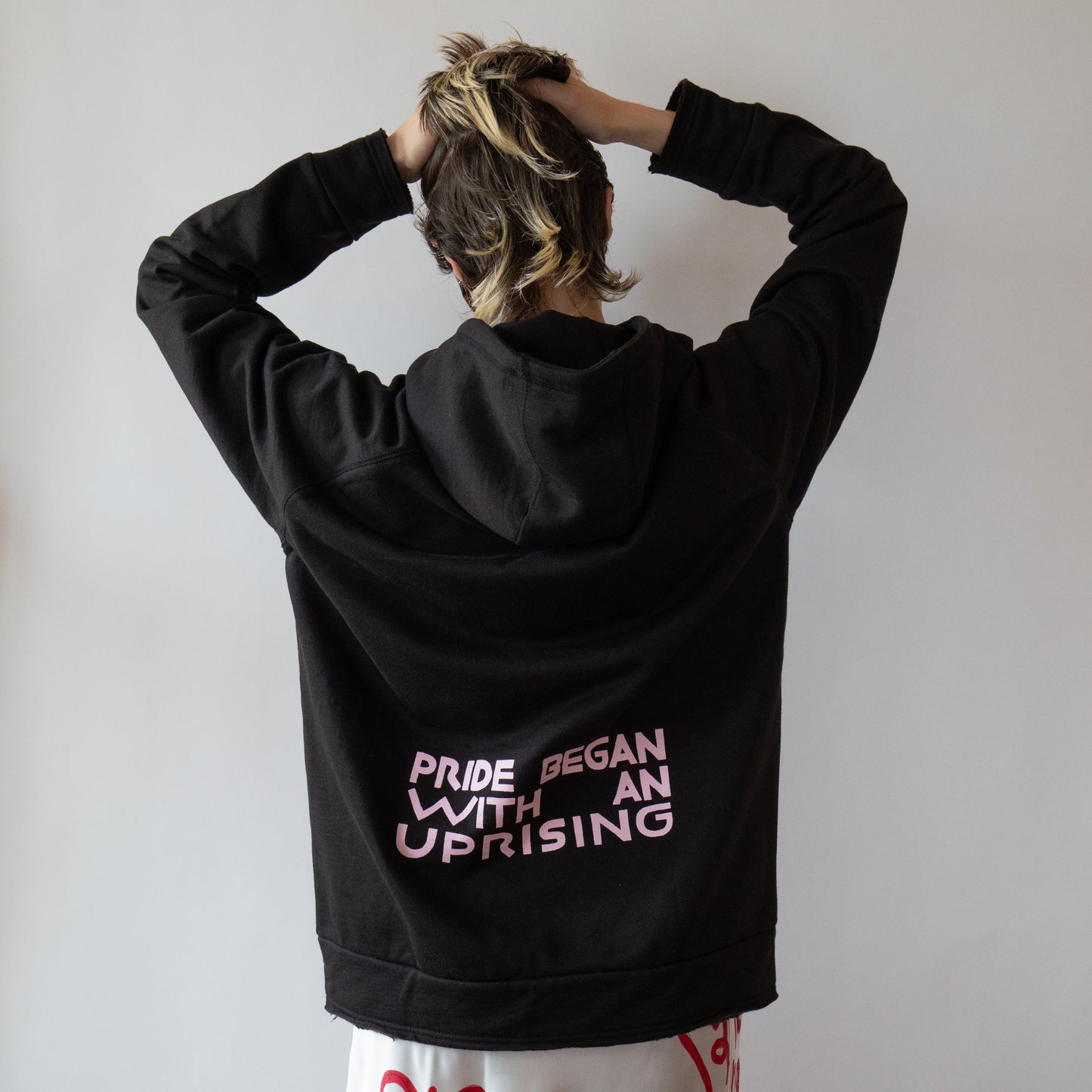 PRIDE BEGAN WITH AN UPRISING zip-up hoodie