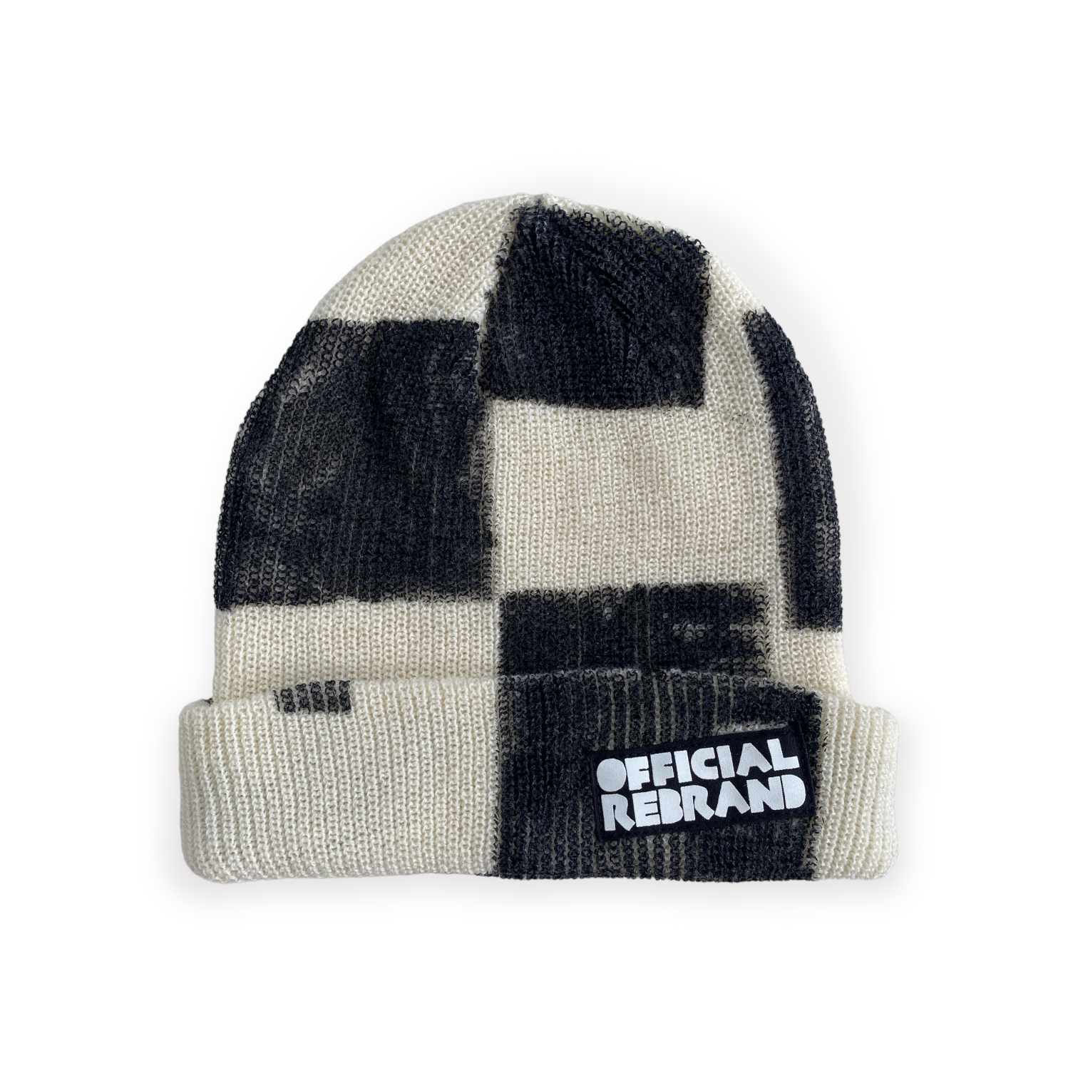 cream beanie with hand painted black checkered squares and a black tag with white text reading OFFICIAL REBRAND on the hat's cuff