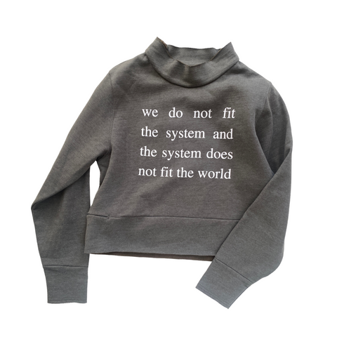 WE DON'T FIT THE SYSTEM cropped sweatshirt