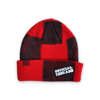 red beanie with hand painted black checkered squares and a black tag with white text reading OFFICIAL REBRAND on the hat's cuff