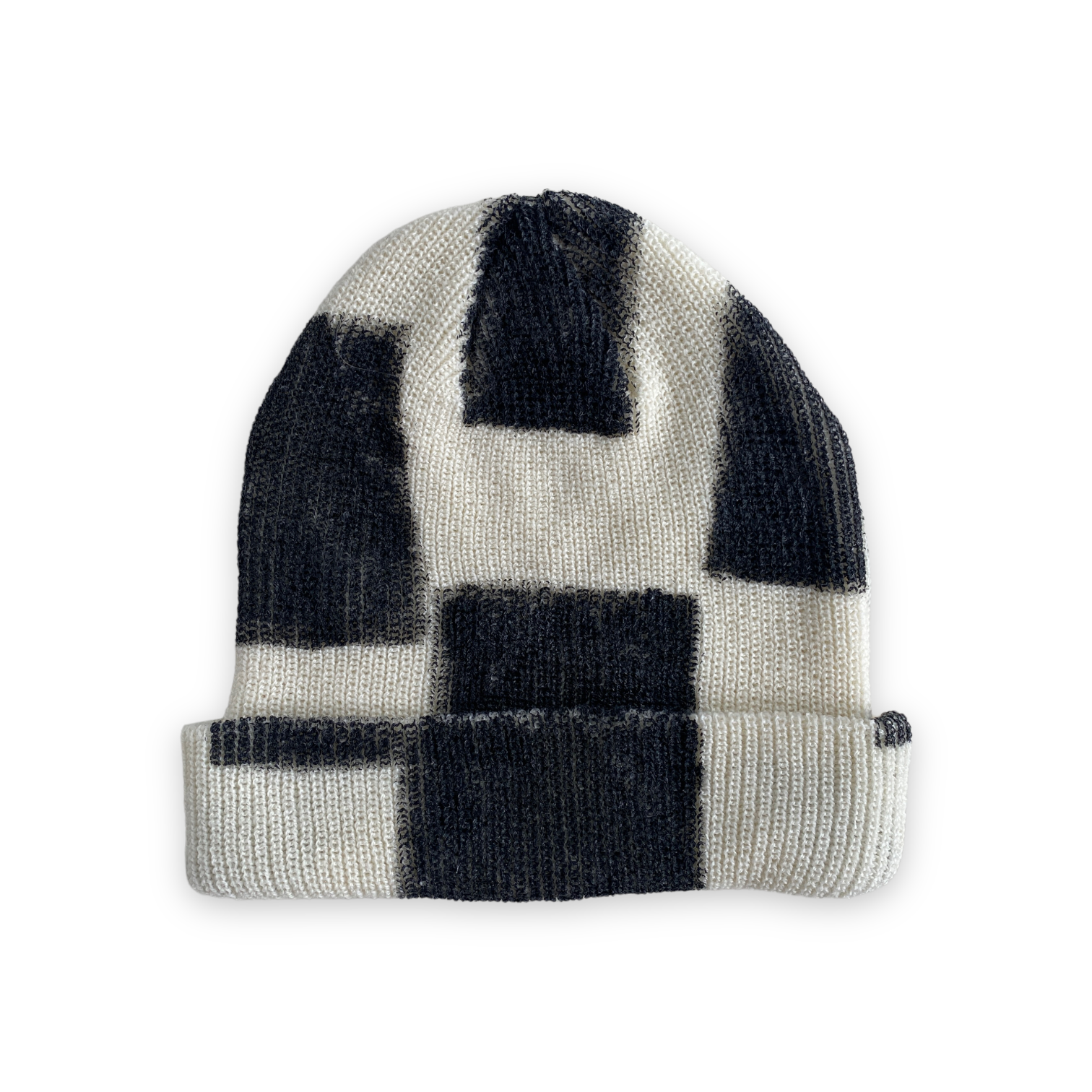 back of cream beanie with hand painted checkered black squares