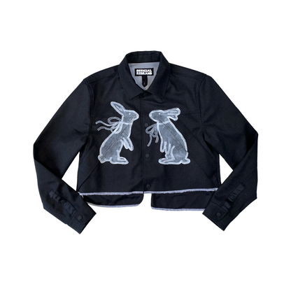 white edged cropped black wool jacket hand-painted with two white rabbits with bows facing each other on the front