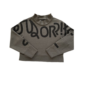 olive green mockneck with hand-painted cursive text across the arms and chest reading LOVERS OR FRIENDS